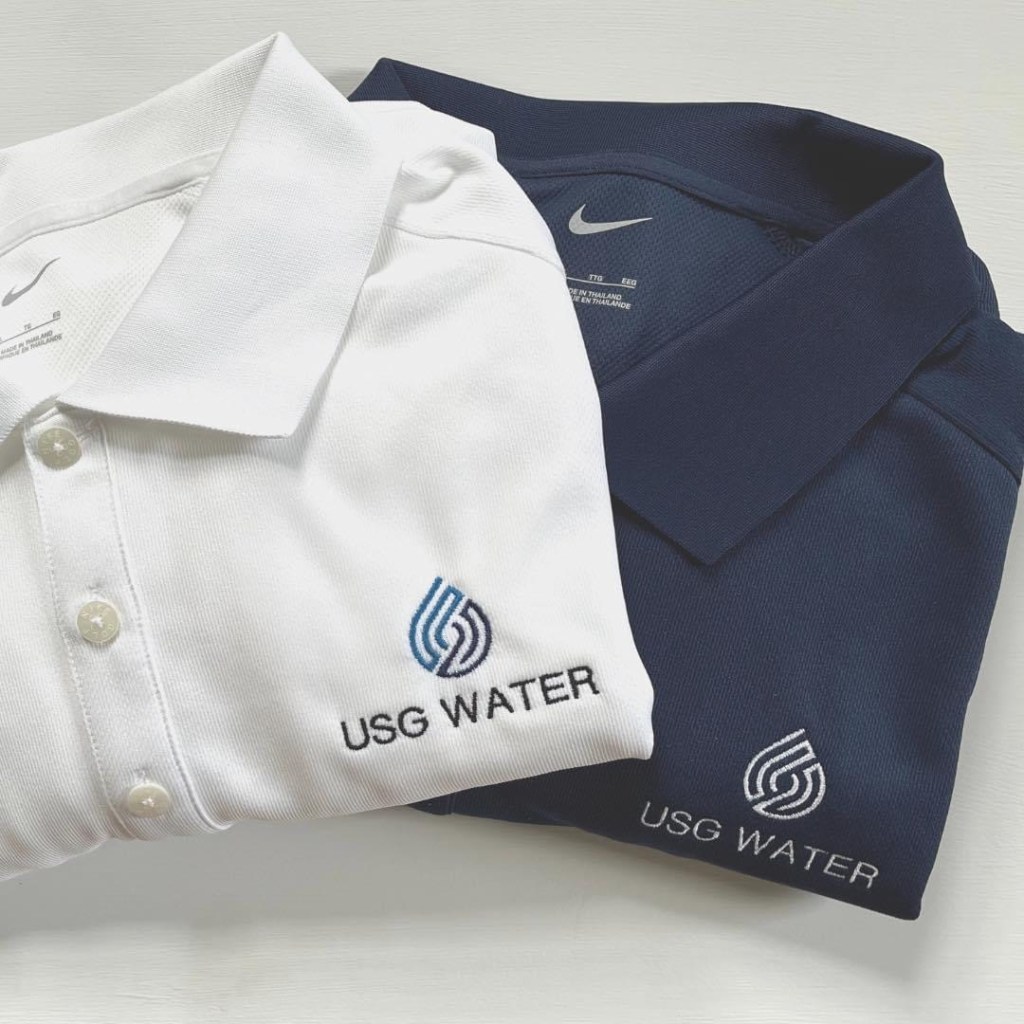 white and navy polos with embroidered logo